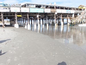 Finish line for both 10k and 1/2 marathon parallels the start line and is about 60 feet south of Cocoa Beach Pier.